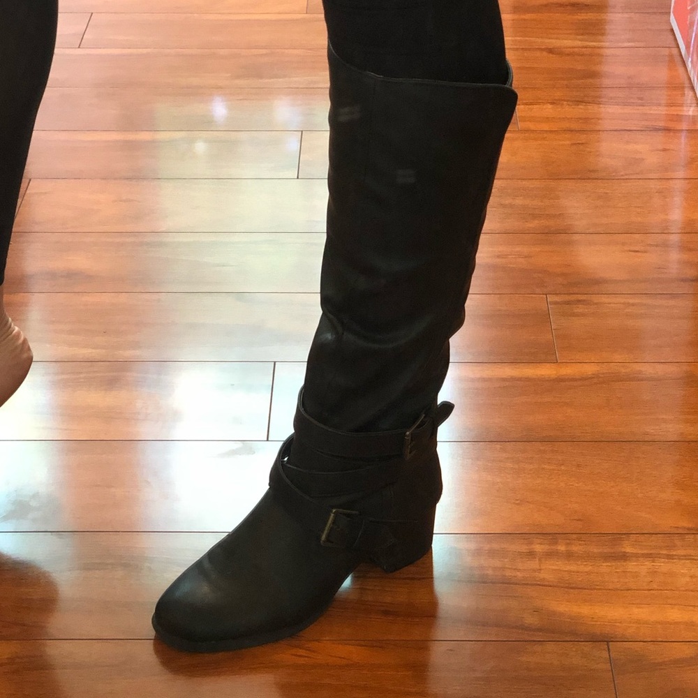 Tall black boots with zipper